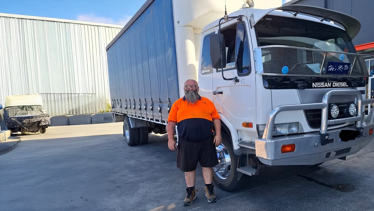 Willett Logistics & Transport truck at loading dock during sunrise providing reliable freight services in Australia